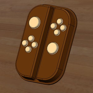 Könnte beinhalten: Ein brauner Nintendo Switch Joy-Con-Controller mit weißen Knöpfen.