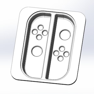 May include: A white plastic mold for a Nintendo Switch controller. The mold has cutouts for the buttons and joysticks.
