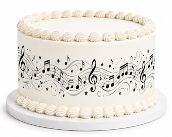 May include: A round white cake featuring a black musical note pattern around the side. The design includes treble clefs, staff lines, and stars. The top and bottom edges are decorated with a piped white frosting border on a white cake board.