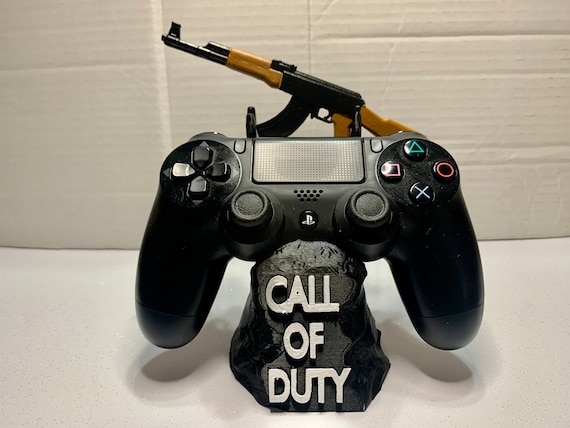 STL file Call of Duty: Modern Warfare 3 Controller Stand, Playstation PS4  PS5