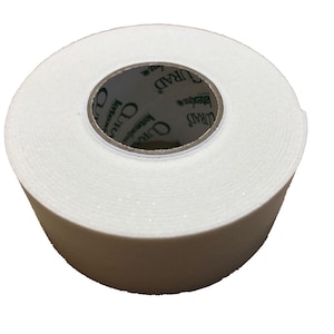May include: A roll of white athletic tape with a green label that reads "CURAD" and "Bandage Tape".