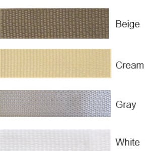May include: A swatch card displaying eight different fabric colours: black, brown, beige, cream, grey, white, pink, and orange.