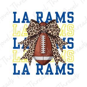 May include: A graphic design featuring a football with a leopard print bow. The words "LA RAMS" are stacked in blue and yellow. This design is perfect for sports fans.