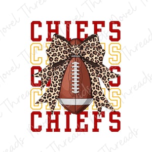 May include: A graphic design featuring a brown football with white laces centred behind a large leopard print bow. The word CHIEFS is repeated in red and yellow block lettering in the background, creating a layered sports-themed composition.