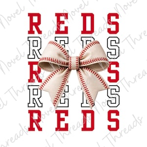 May include: A baseball-themed design featuring the word "REDS" in red and black block letters. A bow made from baseball material is centered in the design. The bow has red stitching, and the background is white.