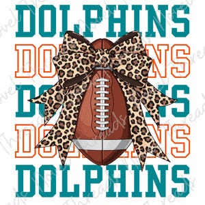 May include: A football with a leopard print bow, set against a white background. The word "Dolphins" is displayed in teal and orange, repeated multiple times. The football is brown with white laces.
