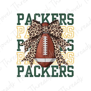 May include: A graphic design featuring the word PACKERS in dark green block letters, layered behind a brown American football with white laces and a white stripe. A large, decorative bow with a tan and black leopard print sits on top.