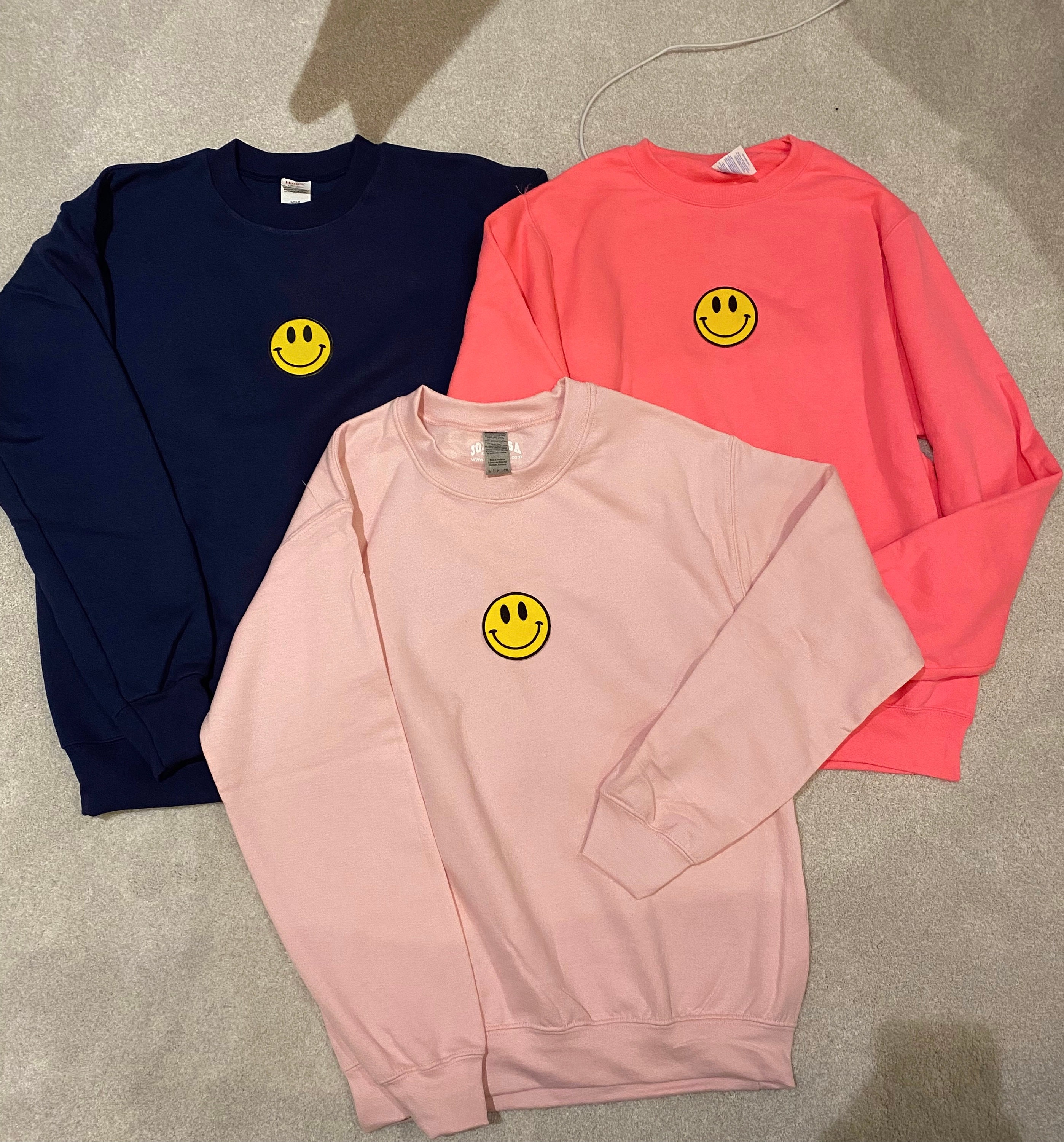 smiley face patch sweatshirt
