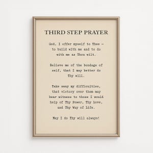 Puede incluir: Impresión enmarcada con el texto "THIRD STEP PRAYER" en una fuente serif. La oración está impresa en tinta negra sobre un fondo color crema. El marco es de color dorado fino. La oración es un texto espiritual.
