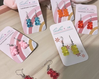 Hypoallergenic Gummy Bear Earrings. Colorful Resin. Multiple varieties and great Xmas gifts. Dangle earrings, skin safe and age friendly.