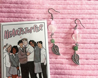 Heartstopper love inspired earrings. Rose quartz, glass, stainless steel earrings. Leaf & heart dangle. Book inspired. Perfect gift.