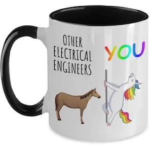 May include: White coffee mug with a black handle and black rim. The mug has a graphic of a unicorn and a horse with the text "Other Electrical Engineers" and "You" in rainbow colors.