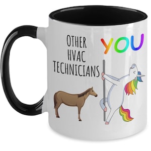 May include: White coffee mug with a black rim and handle. The mug features a graphic of a unicorn doing a pole dance with the text "You" above it. Below the unicorn is a brown horse and the text "Other HVAC Technicians".