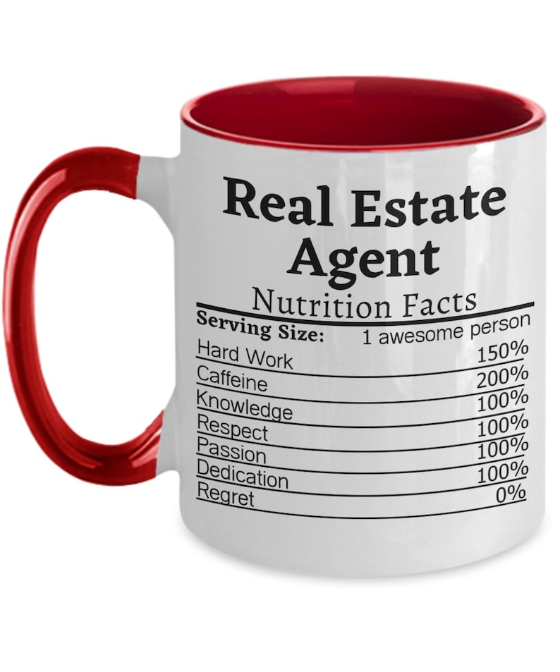 May include: White ceramic coffee mug with a red rim. The mug features a black and white graphic of a nutrition facts label for a "Real Estate Agent". The label lists the following: Hard Work 150%, Caffeine 200%, Knowledge 100%, Respect 100%, Passion 100%, Dedication 100%, Regret 0%.