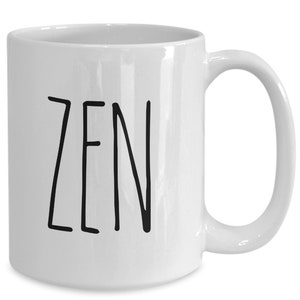 Pu&ograve; includere: Tazza da caff&egrave; in ceramica bianca con una grafica nera "ZEN".