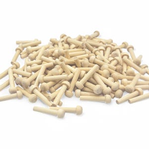 Pack of 50 Toy Wheel Axle Pegs for 30mm hole 6mm diameter tenon