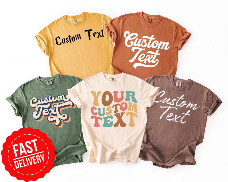 May include: Five t-shirts in various colours, including yellow, brown, green, cream, and brown, each bearing the words "Custom Text". The text is displayed in different fonts and colours. A red sticker with "Fast Delivery" is in the bottom left corner.