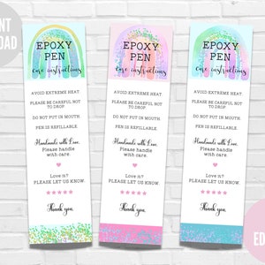 May include: Three colorful rainbow-themed cards with the text "Epoxy Pen Care Instructions" and instructions for handling the pen. The cards have a glittery background and are decorated with stars and the text "Thank you".