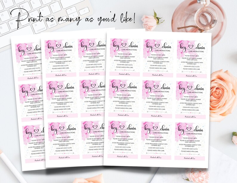May include: A set of 18 printable pink and white key chain care instruction tags. The tags feature a watercolor-style background with a pink heart and the text "key chain" and "care instructions". The text on the tags reads: "Please do not drop, Please do not rough, Avoid prolonged contact with hard surfaces, Avoid prolonged contact with extreme heat, Clean with soft cloth, Handle with care, Handmade with love."