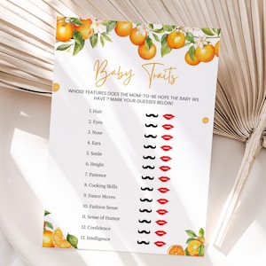 May include: A printable baby shower game with a citrus theme. The game asks guests to guess whether the baby will inherit certain traits from the mother or father. The traits are listed on the left side of the page, and the options are represented by a red lipstick for the mother and a black mustache for the father.