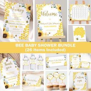 Può includere: Pacchetto di 26 articoli stampabili per un baby shower a tema ape, tra cui inviti, biglietti di ringraziamento, etichette per bottiglie d'acqua, topper per cupcake, un cartello di benvenuto e una scheda per la lotteria dei pannolini. Il design presenta un motivo a nido d'ape giallo, girasoli e api.