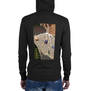 Puede incluir: Sudadera con capucha y cremallera gris oscuro con un gráfico en la espalda. El gráfico presenta las palabras "The Tower" y "Shaka, When the Walls Fell" con una ilustración de una estructura que se derrumba y figuras.