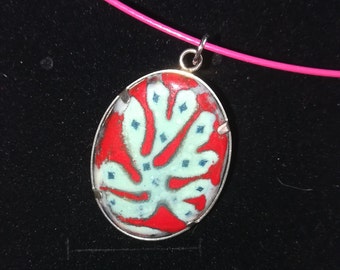 Enamelled pendant and its cord