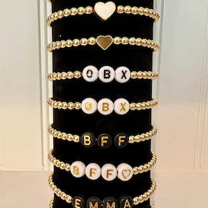 Braccialetti con perline in oro 14K