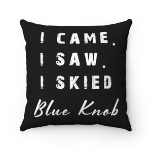 May include: Black throw pillow with white text that reads "I came. I saw. I skied Blue Knob".