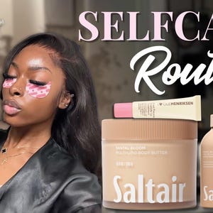 May include: A woman holding a green drink in a glass with a straw, wearing eye patches, and surrounded by beauty products. The image includes products from Saltair, C&Eacute;CRED, and Ole Henriksen, with the words "SELFCARE Routine" in the background.