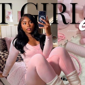May include: A collage featuring a person in pink activewear, a Bible, and fitness accessories. The text "FIT GIRL era" is displayed across the top. The image includes a pink yoga mat, a water bottle, and a journal.