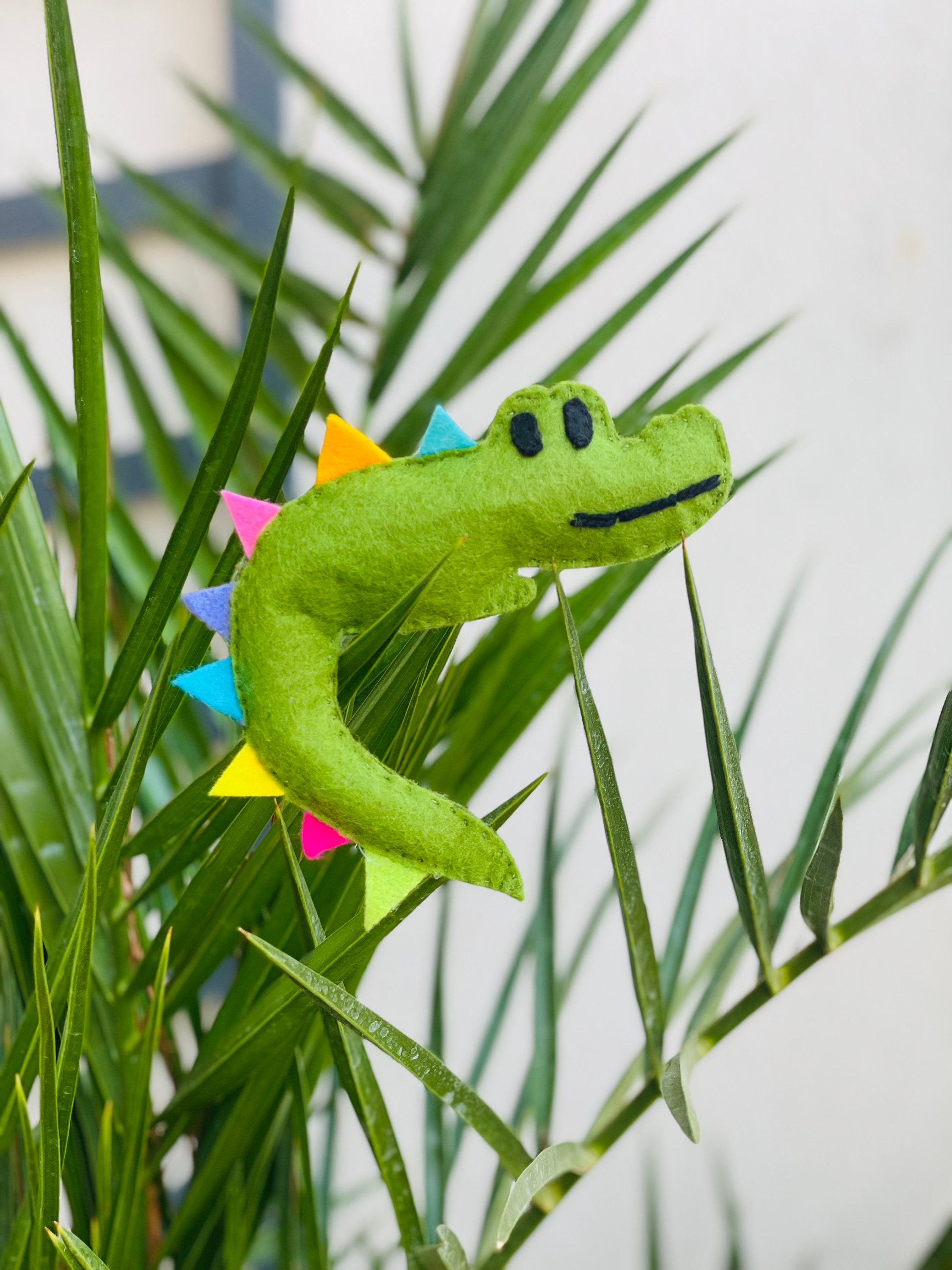 Odile Le Crocodile à L'herbe Chat