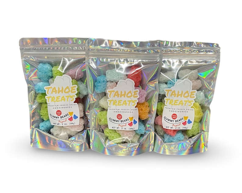 May include: Three bags of freeze-dried gummy bears in assorted colors. Each bag has a label that says "Tahoe Treats" and "Gummy Bears". The bags are made of iridescent silver foil.