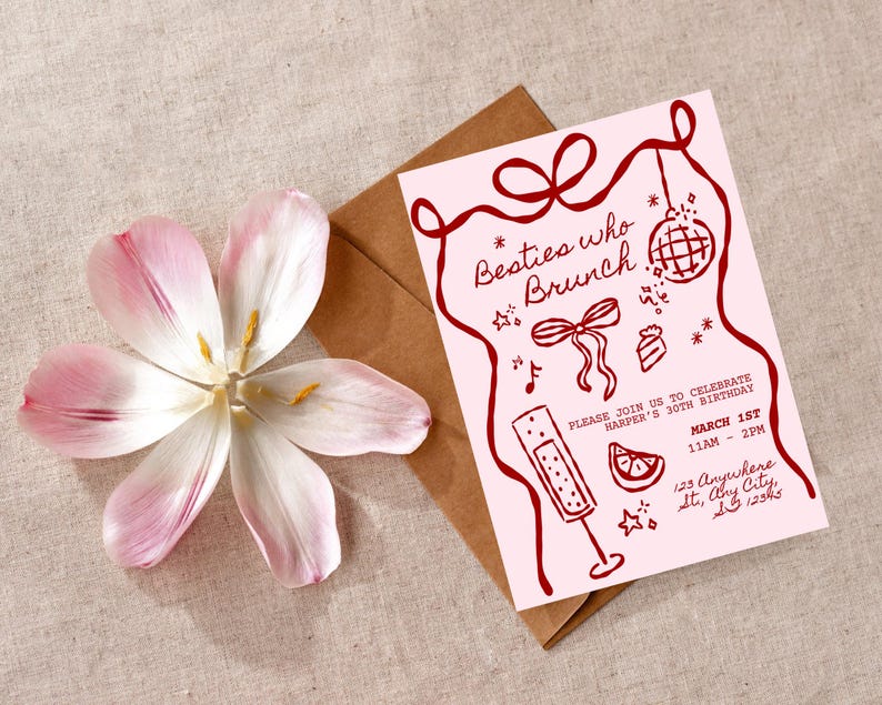 May include: A pink invitation with the text "Besties who Brunch" and red illustrations. A brown envelope and a pink and white flower are also in the image.
