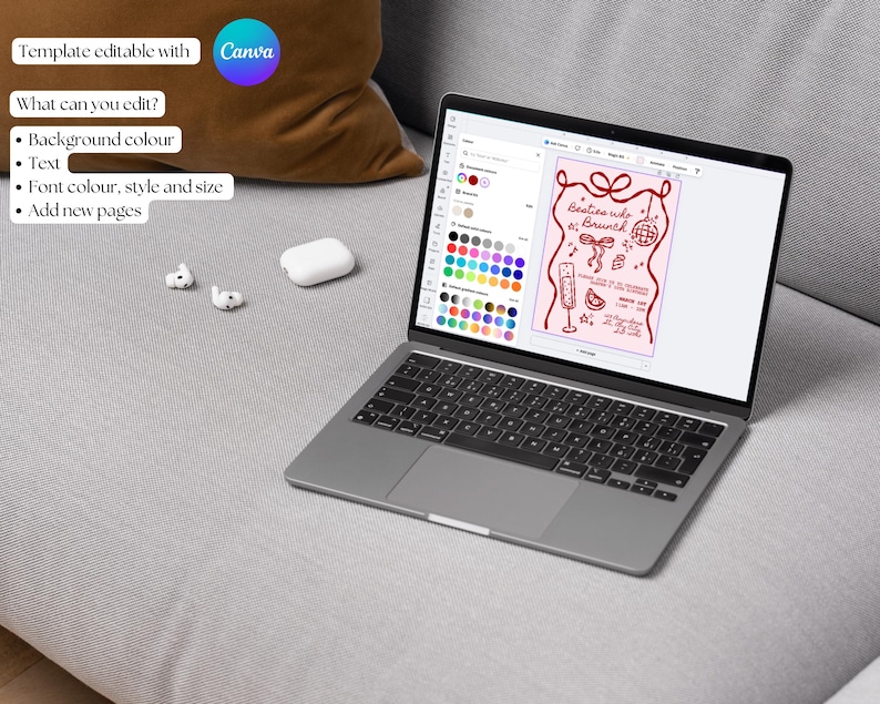 May include: A laptop screen shows a design template with the text "Besties who Brunch" in red. The screen displays a pink background with editable elements. The laptop is on a grey surface with a brown cushion and white earbuds.