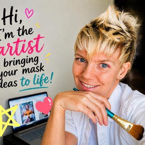 Artist creating custom therian mask, fox mask design shown on laptop, handmade animal mask shop