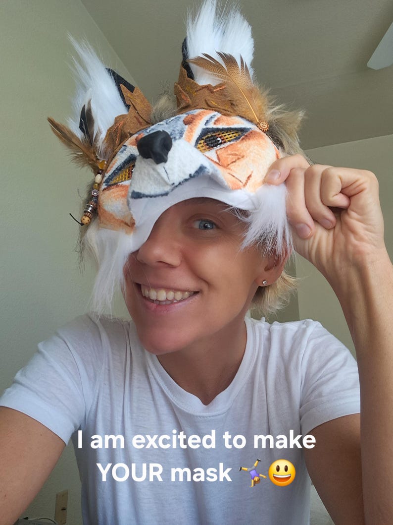 The artist of the therian coyote mask, Forest, showing the wearability
