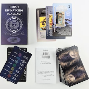 May include: A tarot card deck with a box and several cards. The box is dark purple with the text "TAROT DIVINATOIRE FRAN&Ccedil;AIS" and a sun and moon design. The cards feature illustrations and text in French.