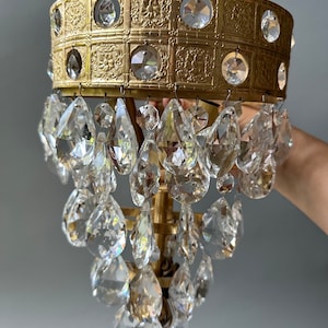Vintage crystal and brass wall sconce / ornate floral motif details / wall lamp / vintage lighting / wall decor display / retro lamp
