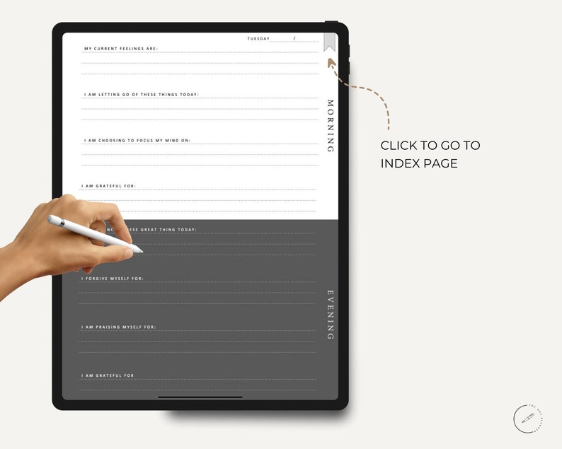 May include: A digital planner on a tablet screen with a gray background. The planner is divided into two sections: Morning and Evening. Each section has prompts for reflection and gratitude. The text "CLICK TO GO TO INDEX PAGE" is visible on the screen.