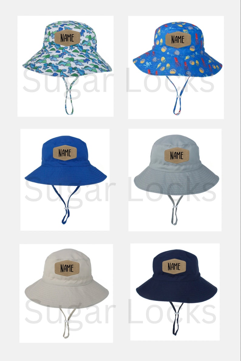 May include: Six different styles of children's sun hats with adjustable chin straps. The hats are made of a lightweight fabric and feature a brown patch with the word "NAME" printed in black.