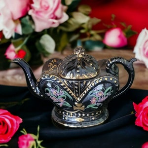 19th century Victorian Jackfield Teapot. Crown Shaped. Made in England. High Gloss Black Glaze with Hand Painted Flowers and Gilding