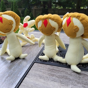 Peluche Uxie lucido