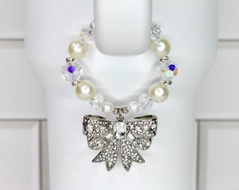 Pearl Elegance Bow Tumbler Handle Charm Bracelet