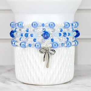 Blue Coquette Winter Ice Bracelet Collection: Sky Blue and Crystal Bracelets with Bow Charm