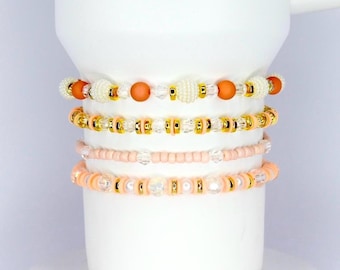 Orange and Gold Bracelet Stack with Pearl and Clear Bead Accents
