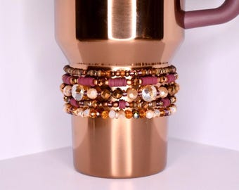 Polished Rose Gold Bracelet Collection: Maroon, Brown, and Cream Beaded Bracelets