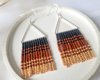 Silver triangle earrings with black, brown and gold beaded fringep