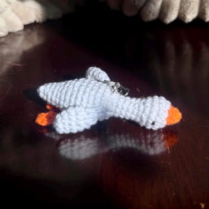 crochet handmade silly goose keychain