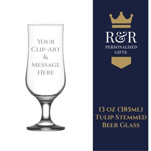 May include: A clear glass tulip-shaped beer glass with a stem. The glass is 13 fluid ounces (385 ml) and has the text "YOUR CLIP-ART & MESSAGE HERE" engraved on it.